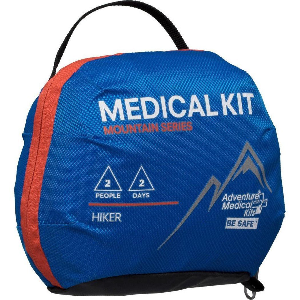 A blue and orange Adventure Medical Kits Mountain Hiker Medical Kit with a black handle and zipper pull, showing "2 People 2 Days" and "Be Safe" text.