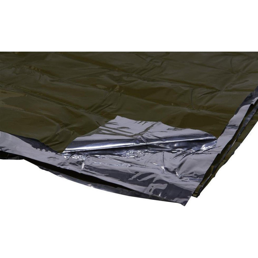 A close-up of the Adventure Medical Kits SOL Heavy Duty Emergency Blanket showing its reflective silver underside and olive green top layer.