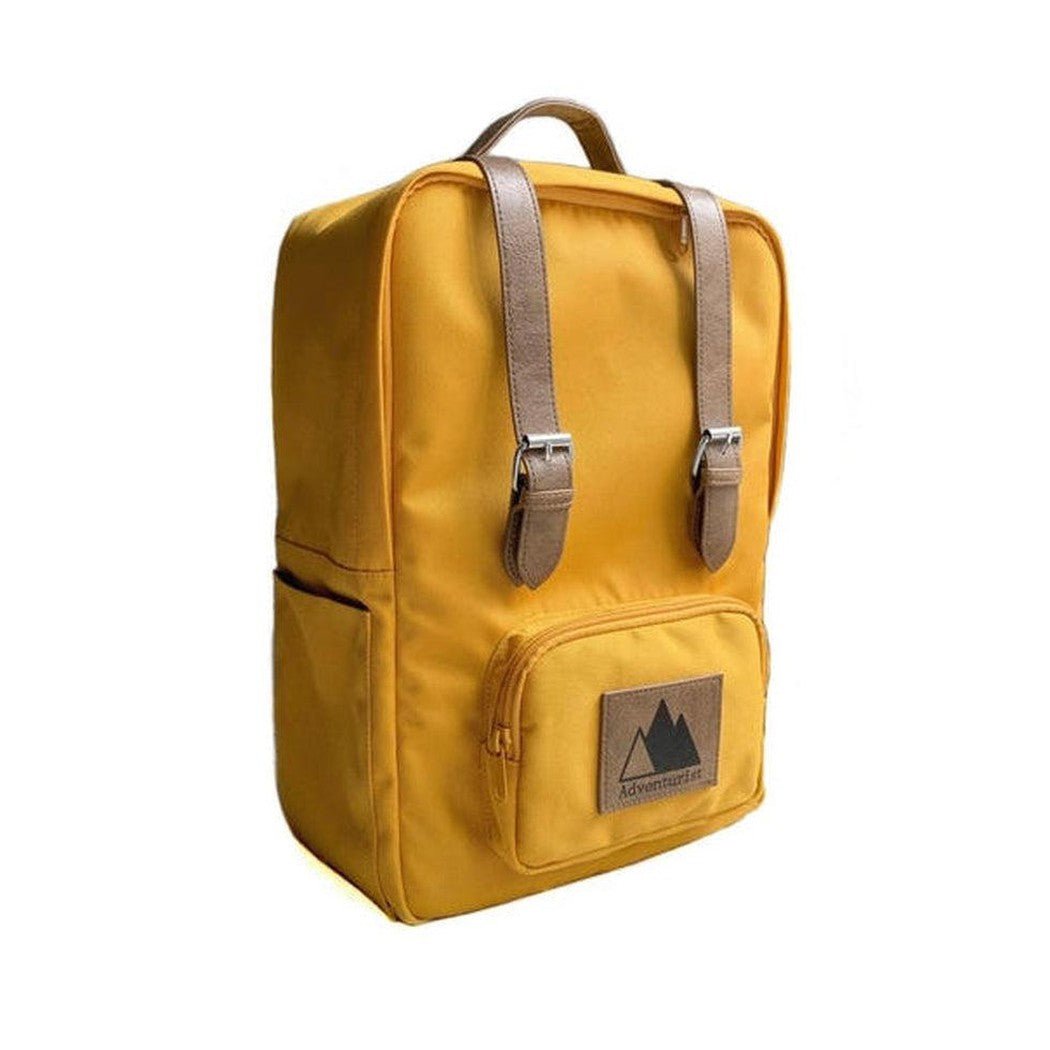 A front view of the Adventurist Backpack Co. Classic Backpack in Adobe color showing the front pocket and buckle straps against a white background.