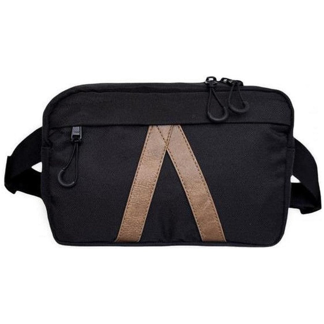 A black Adventurist Backpack Co. Summit Sling Bag with brown accents is shown from the front against a white background.
