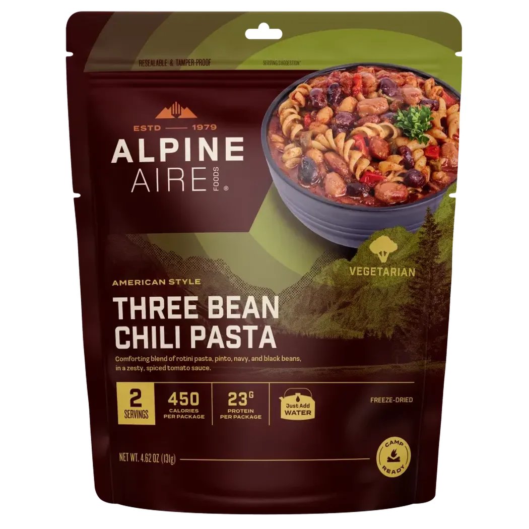 A front view of the AlpineAire Three Bean Chili Pasta backpacking food package showing the bowl of chili pasta on the front.