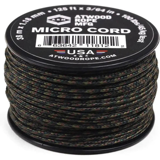 A spool of Atwood Rope Micro Cord in black is shown from a top-down angle on a white background.