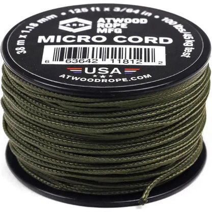 A spool of Atwood Rope Micro Cord in black is shown from a top-down angle with the product details visible on the label.