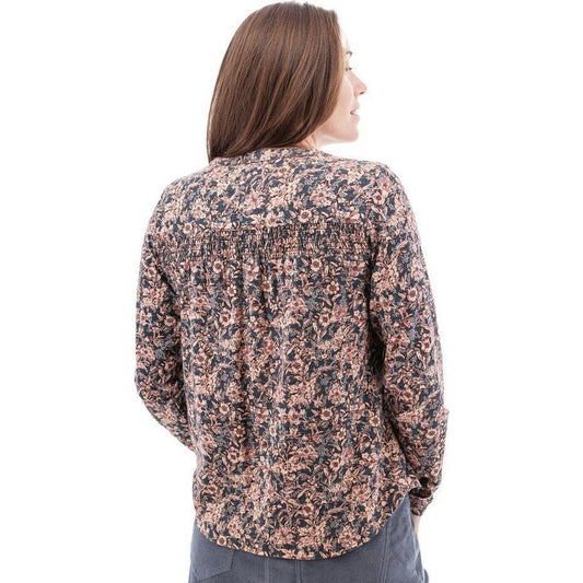 Back view of the Aventura Women's Amaryllis Top in Atlantic Deep on a model against a white background.