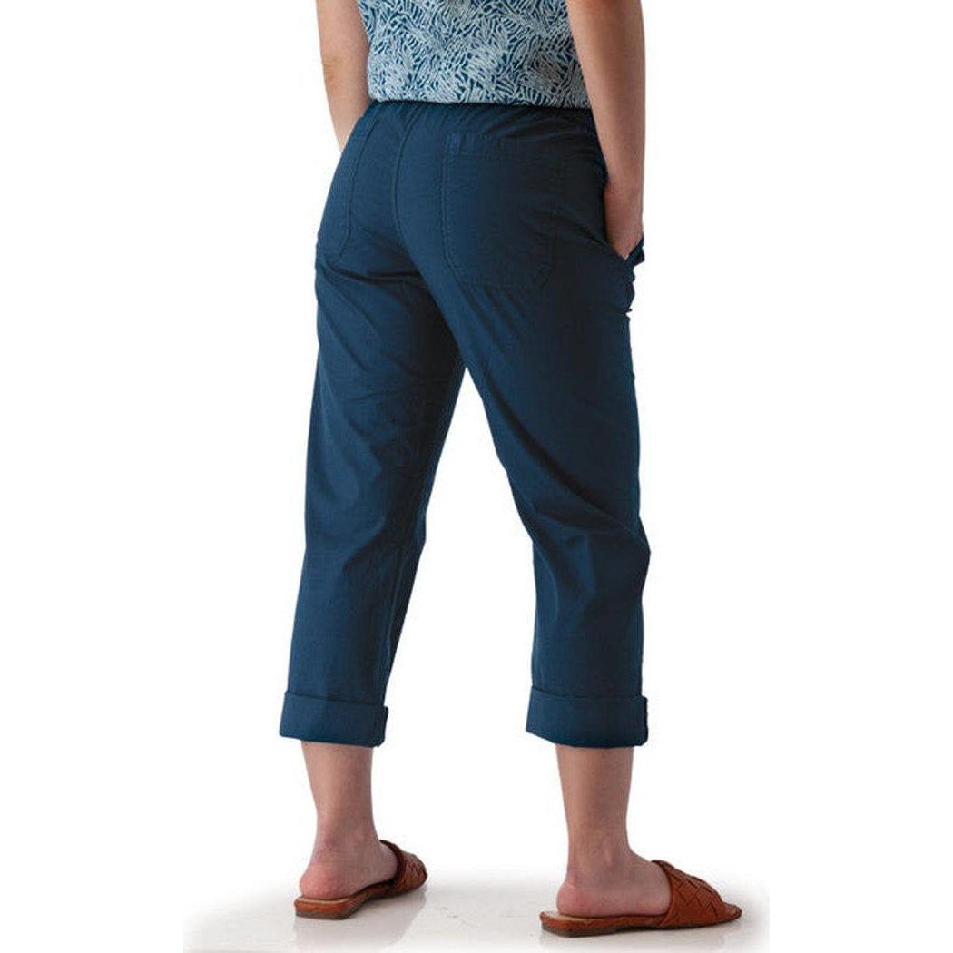 Back view of the Aventura Women's Ballard Ankle Pant in Botanical Green, showing rolled cuffs and a white background.
