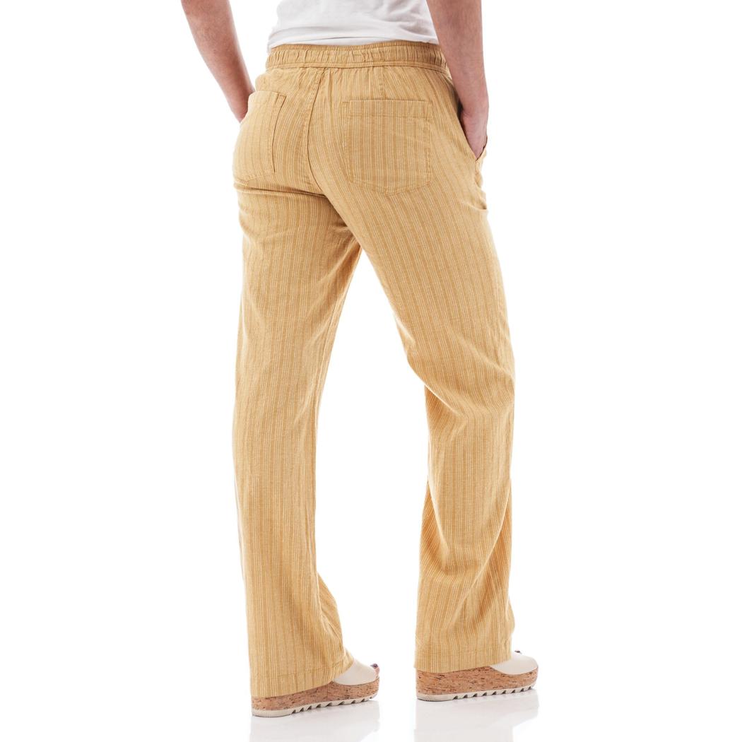 Back view of the Aventura Women's Breeze Pant in Amber Gold showing the elastic waistband and pockets against a white background.