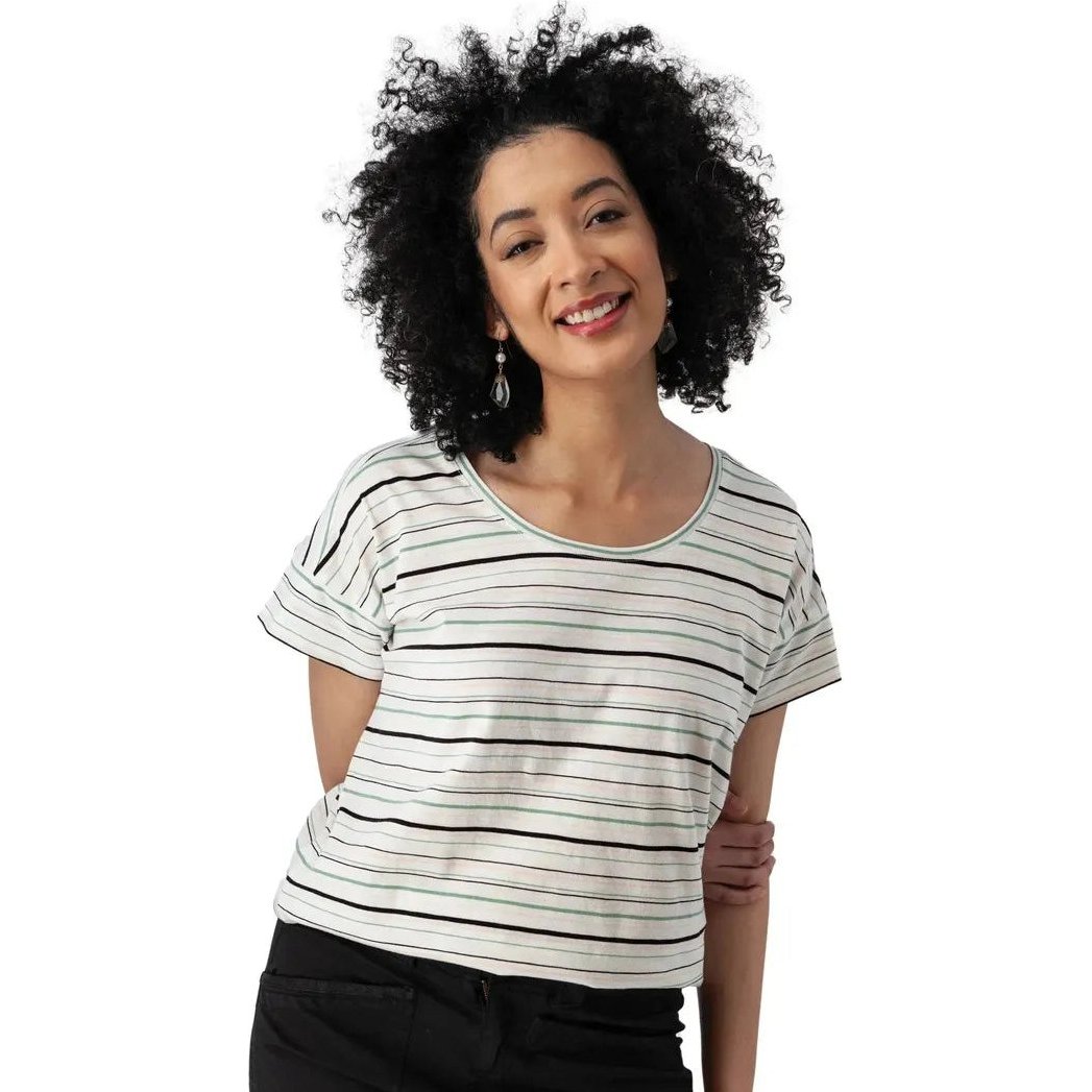 A woman wearing the Aventura Women's Endless Summer Top in Granite Green poses against a white background.
