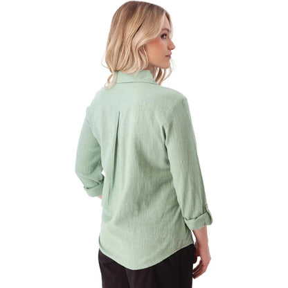 Back view of the Aventura Women's Laken Top in Granite Green, showing rolled sleeves and a white background.