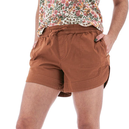 Aventura Women's Parker Short in Gingerbread, front view on model with floral top and white background.