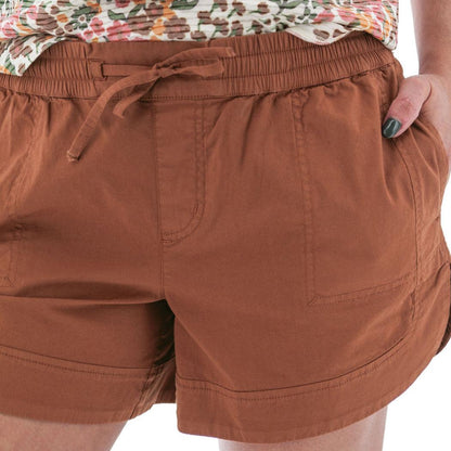 Side view of the Aventura Women's Parker Short in Gingerbread showing the drawstring waist and front pocket against a white background.