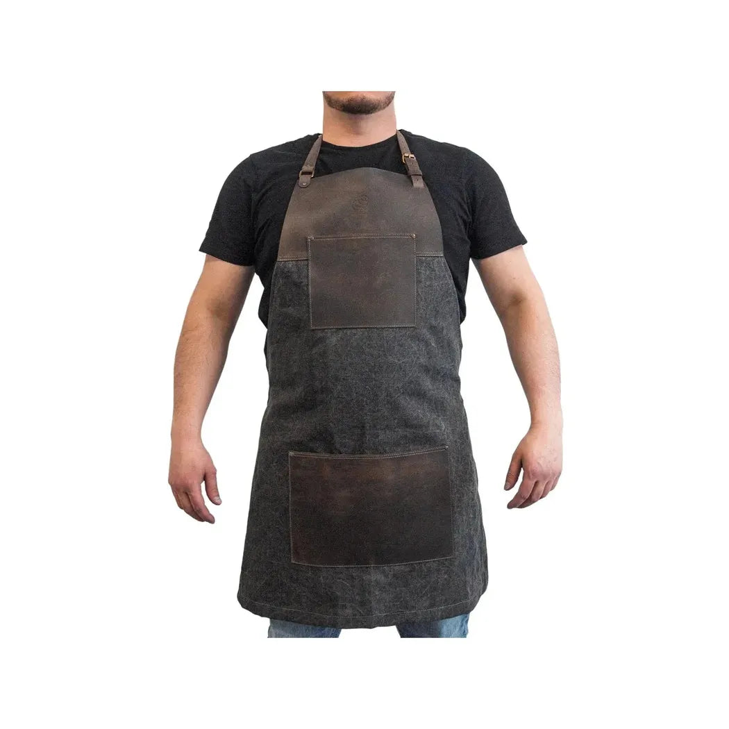 A front view of the Beavercraft Cowhide Apron Leather with two leather pockets against a white background.