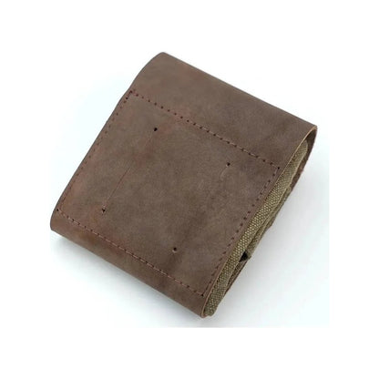 A top-down view of the Beavercraft Leather & Canvas Bushcraft Foraging Belt Bag Pouch for Camping with visible stitching and a canvas interior against a white background.