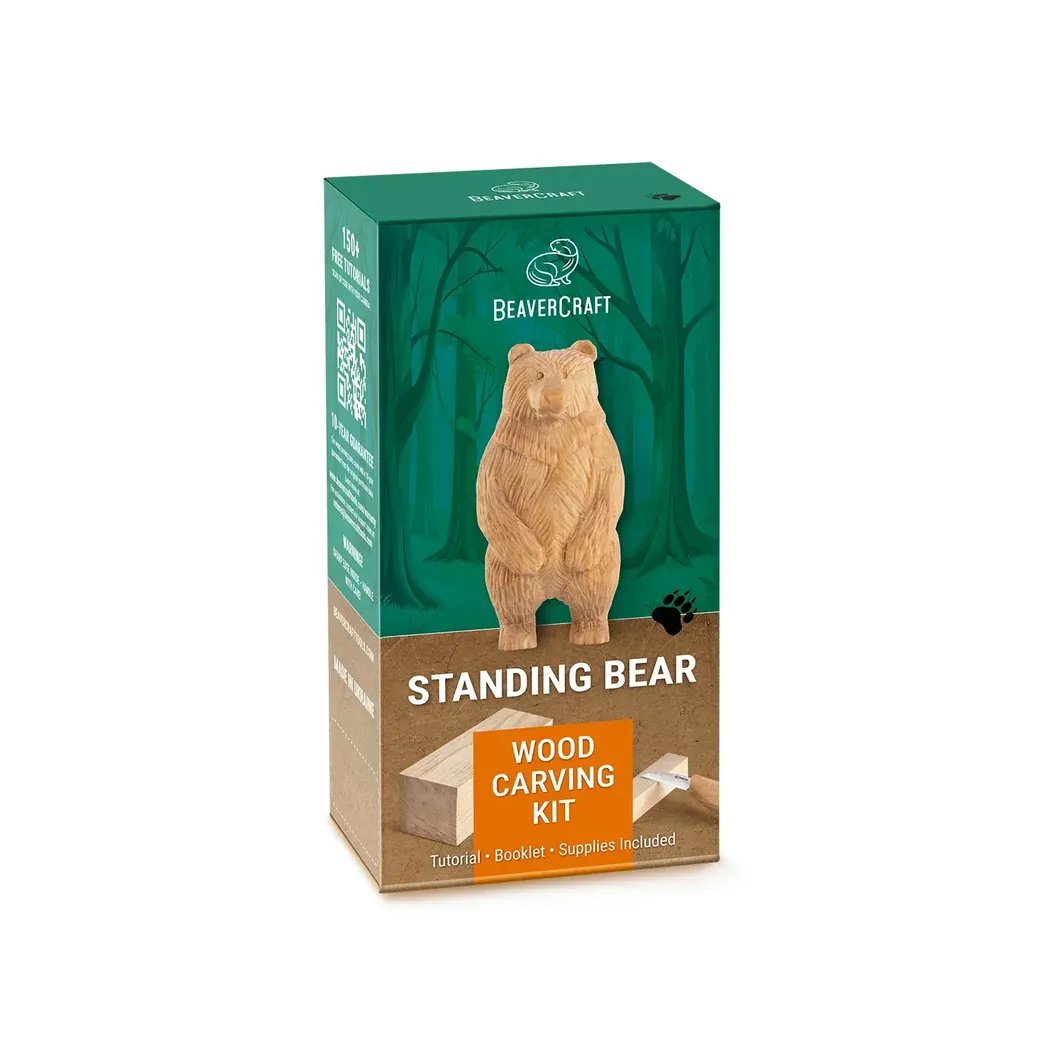 A front view of the Beavercraft Standing Bear Wood Carving kit box showing the bear model and forest background.