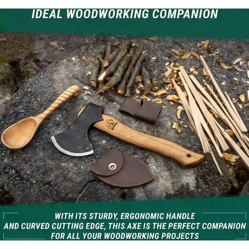 A Beavercraft Woodcraft Bushcraft Splitting Hatchet with a wooden handle sits on a tree stump with wood shavings and sticks around it.