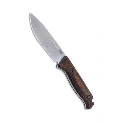 A side view of the Benchmade 15002 Saddle Mountain Skinner knife with a dark brown handle and a white background.
