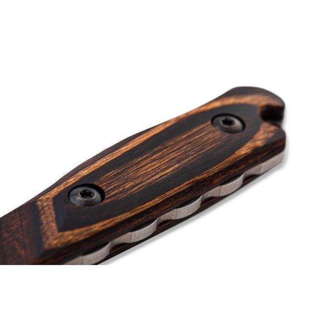 A close-up of the Benchmade 15017 Hidden Canyon Hunter knife handle with two screws and a white background.