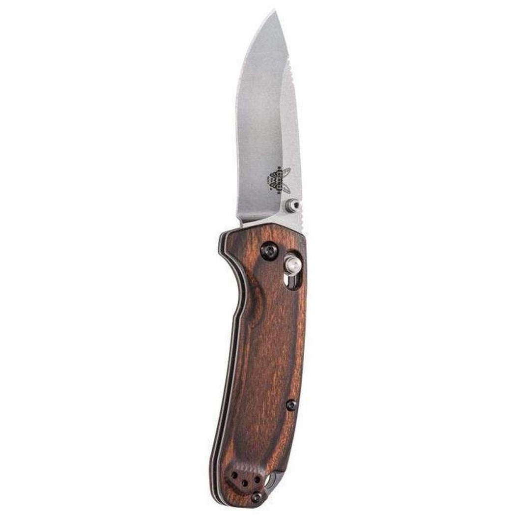 A side view of the Benchmade 15031-2 North Fork knife with a wooden handle and a silver blade against a white background.