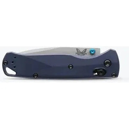 Side view of the Benchmade Bugout knife with a blue handle and a white blade against a white background.