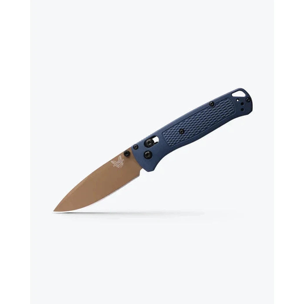 A side view of the Benchmade Bugout knife with a blue handle and tan blade against a white background.