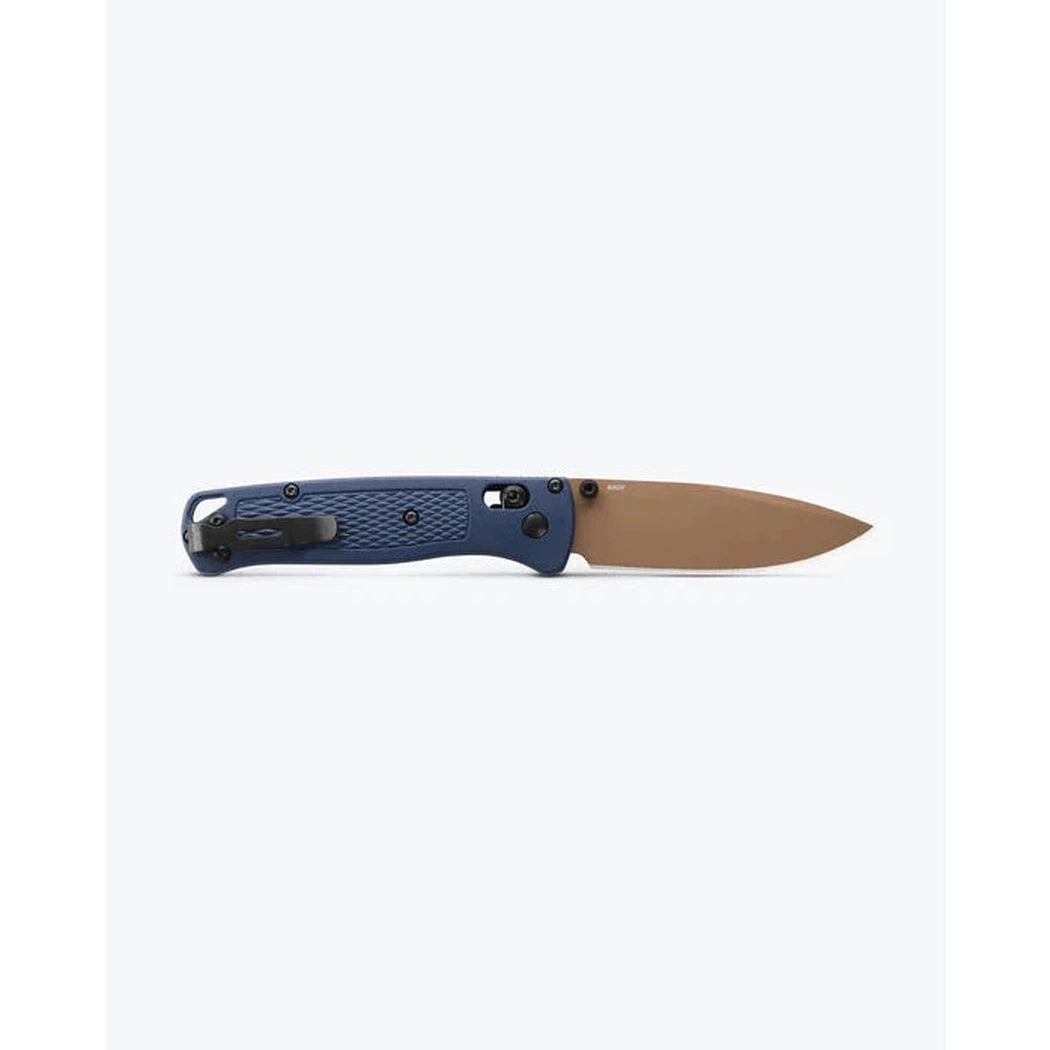 A side view of the Benchmade Bugout knife with a blue handle and tan blade against a white background.