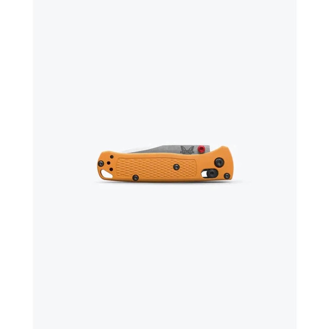 Side view of the Benchmade Mini Bugout with orange handle and black accents against a white background.
