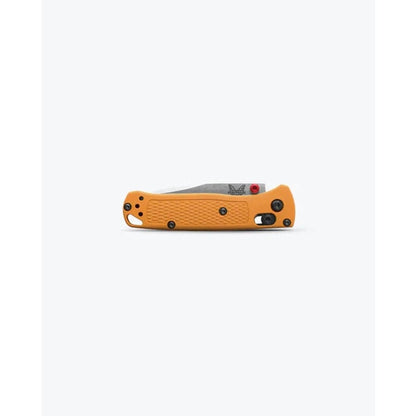 Side view of the Benchmade Mini Bugout with orange handle and black accents against a white background.