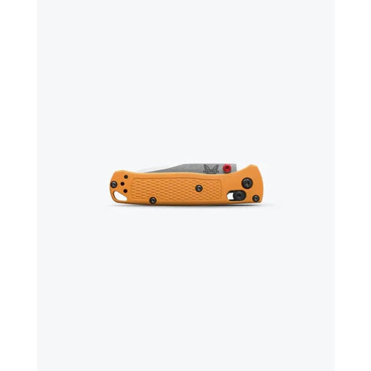 Side view of the Benchmade Mini Bugout with orange handle and black accents against a white background.
