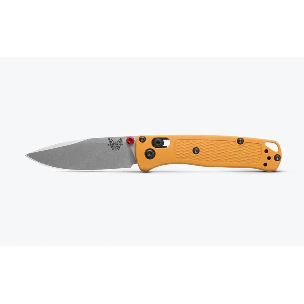 A side view of the Benchmade Mini Bugout knife with an orange handle and a red accent against a white background.