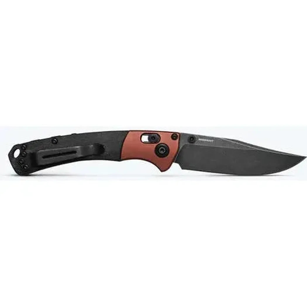 Side view of the Benchmade Mini Crooked River knife with black and red handle against a white background.