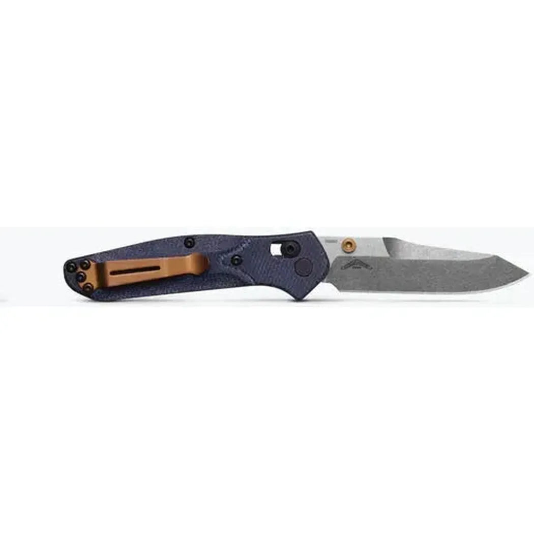 A side view of the Benchmade Mini Osborne knife with a charcoal/gray handle and a silver blade against a white background.