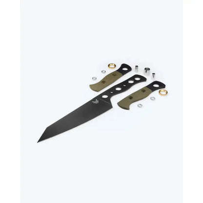 A Benchmade Wildcoast knife with olive green handles and a black blade lies on a white background, showing its design and components.