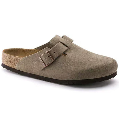 Side view of the Birkenstock Boston Soft Footbed - Suede Leather in Taupe showing the buckle and soft footbed against a white background.