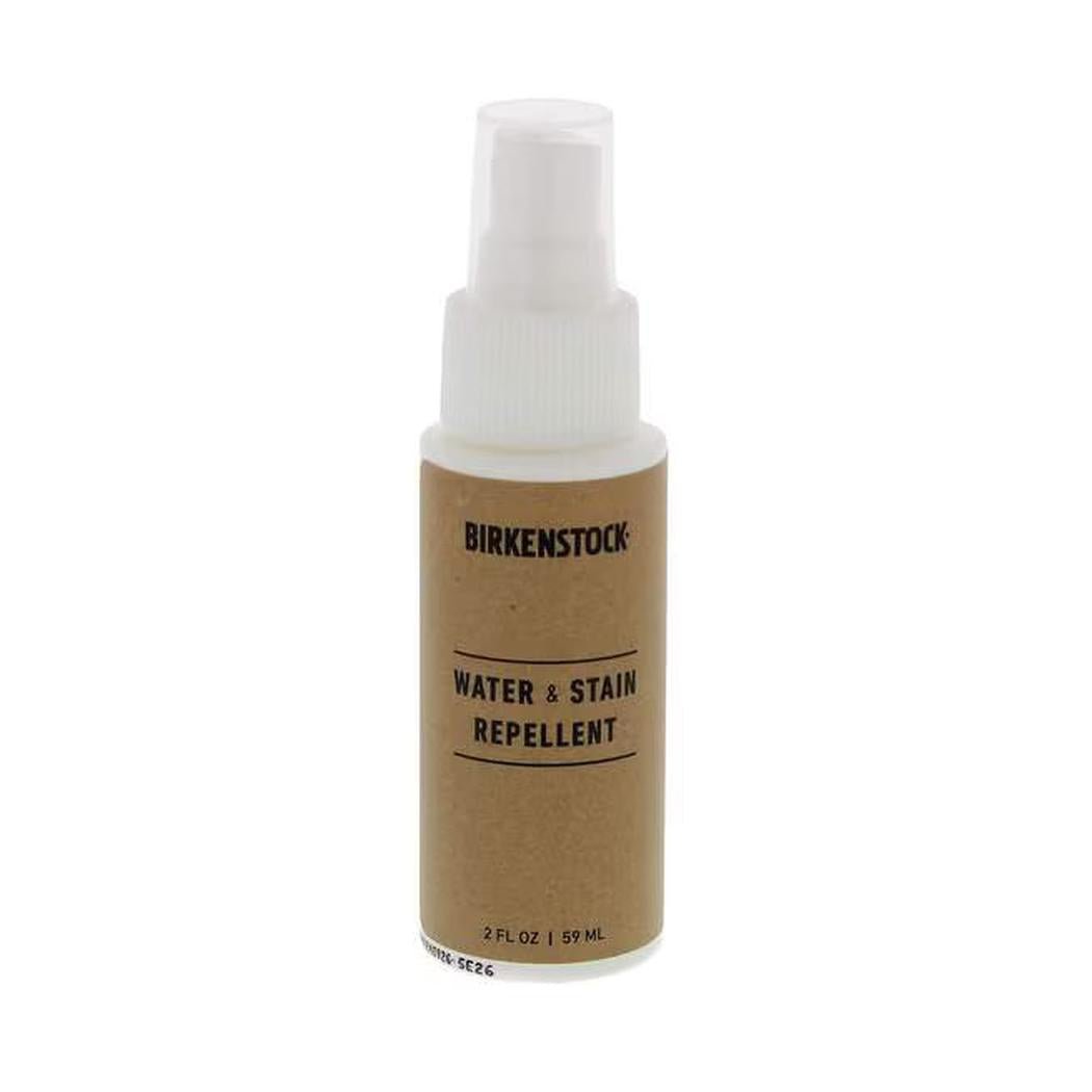 A front view of a Birkenstock Water & Stain Repellent spray bottle with a brown label against a white background.