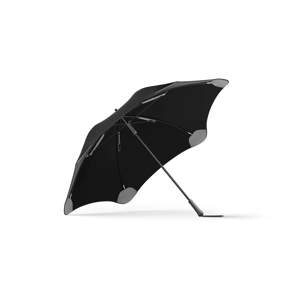 Side view of the Blunt Exec Black umbrella with a white background.