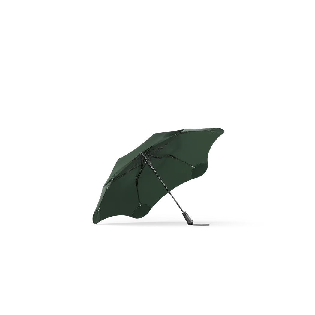 Side view of the Blunt Metro Black umbrella against a white background.