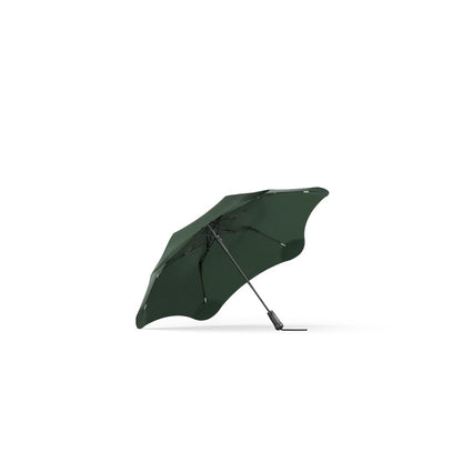 Side view of the Blunt Metro Black umbrella against a white background.