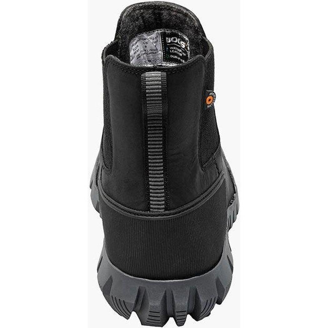Back view of the Bogs Footwear Men's Arcata Urban Leather Chelsea black boot showing the rugged outsole and interior label against a white background.