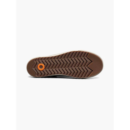 The sole of the Bogs Footwear Men's Kicker Rain Chelsea II in Gray is shown from below with a chevron tread pattern and an orange accent against a white background.