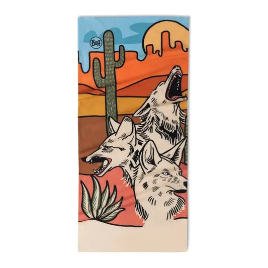 A Buff CoolNet UV - Amino bandana features three howling wolves, a cactus, and desert scenery.