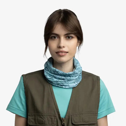 A model wears the Pool colored Buff CoolNet UV Insect Shield - Colfu Pool bandana against a plain white background.