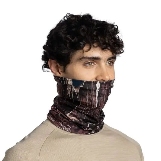 A model wears the Buff CoolNet UV Insect Shield - Teroy multi-colored bandana against a white background.
