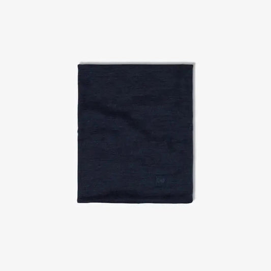 A flat lay of the Indigo Buff Merino Heavyweight Neck Warmer Solid Colors against a white background.