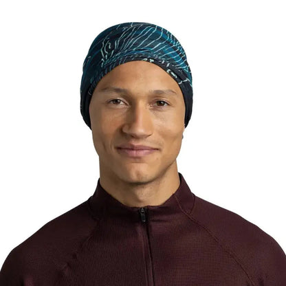 A front-facing photo of a model wearing the Buff Original Ecostretch - Bryn in Tourmaline, against a plain white background.