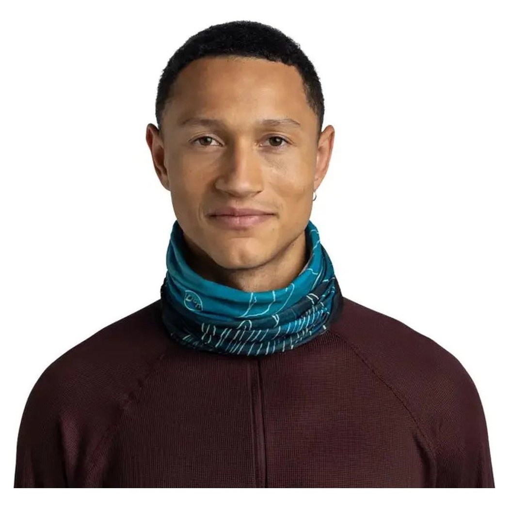 A front view of the Buff Original Ecostretch - Bryn in Tourmaline worn by a model against a white background.