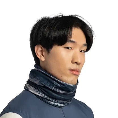 A model wears the navy Buff Polar Reversible - Arky against a white background.