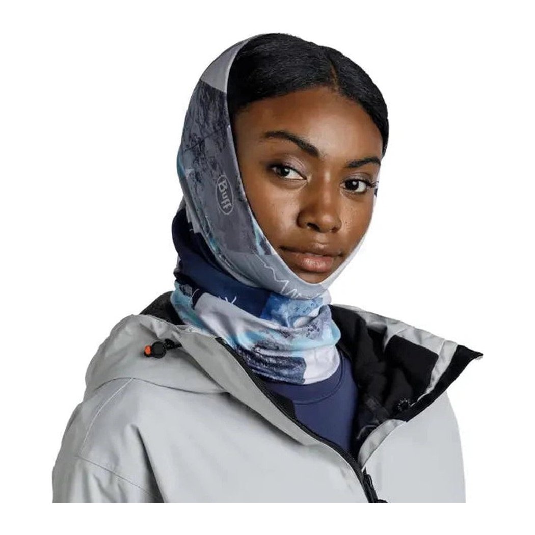 A model wears the blue Buff Thermonet - Synth bandana against a white background.