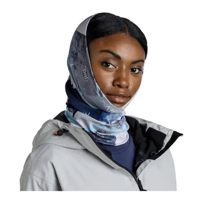 A model wears the blue Buff Thermonet - Synth bandana against a white background.