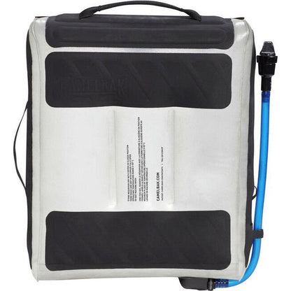 Back view of the CamelBak Fusion Group Hydration Reservoir showing the black and white design with a blue hose attached.