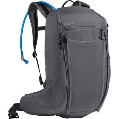 Side view of the CamelBak Shasta 30 100 Oz Hydration Pack in Castlerock Grey/Lake Blue showing the blue hydration tube and front pocket.