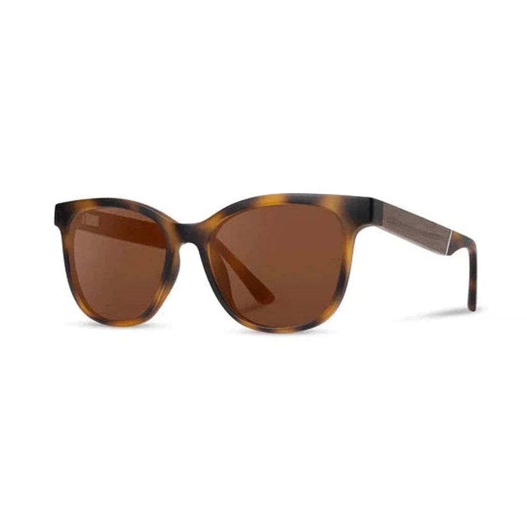 Side view of the Camp Eyewear Cove sunglasses with blue opal lenses and ebony frames against a white background.